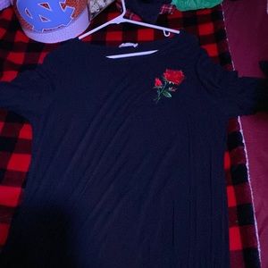 largish black dress with rosé embroidered too uncomfortable for me